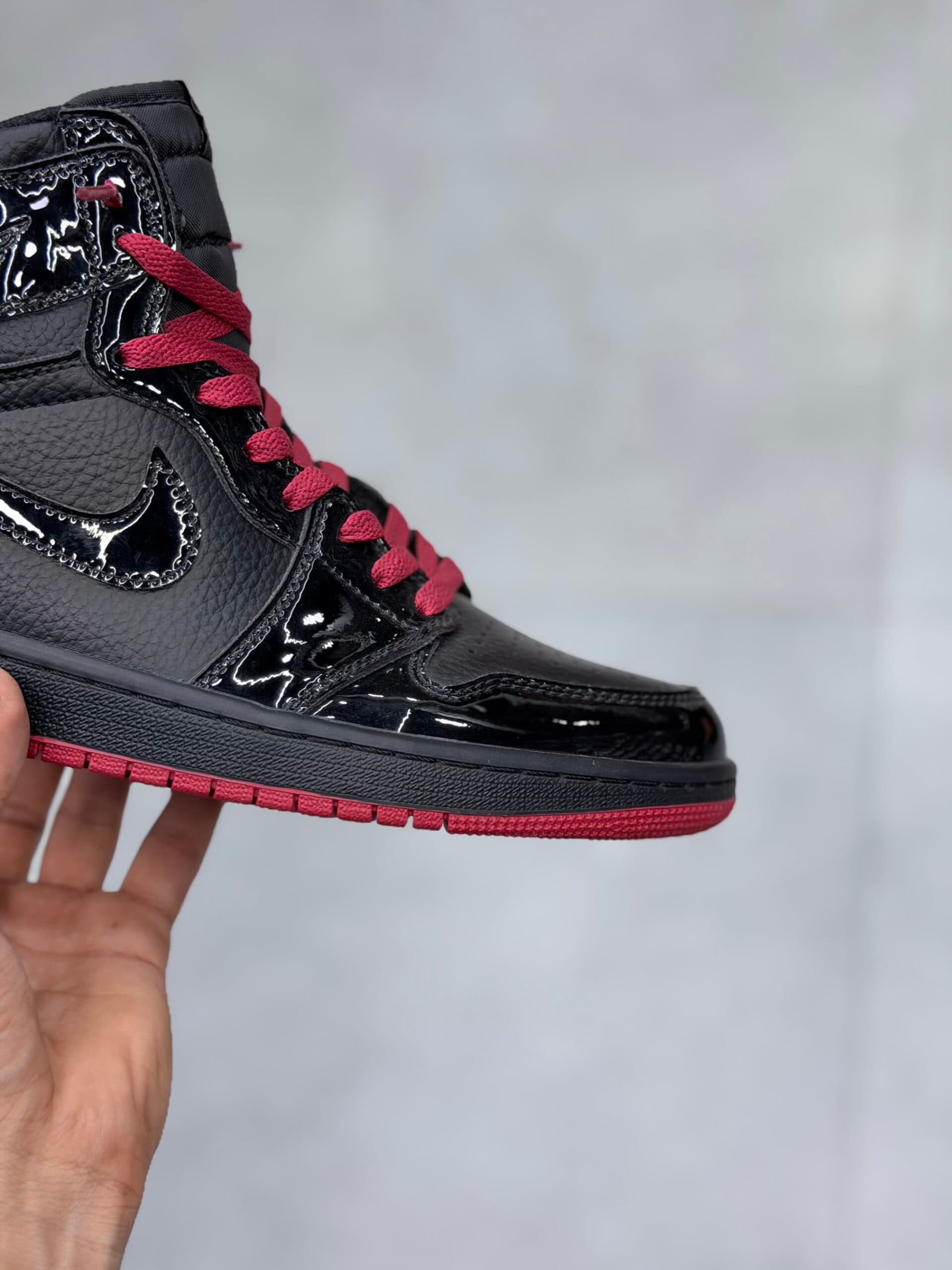 کتونی جردن وان ساقدار ورنی مشکی Air Jordan 1 High SP Gina — تصویر ۹