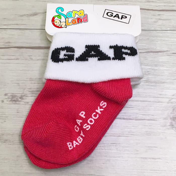 جوراب نوزادی گپ استپ دار GAP مناسب 0 الی 6 ماه — تصویر ۲