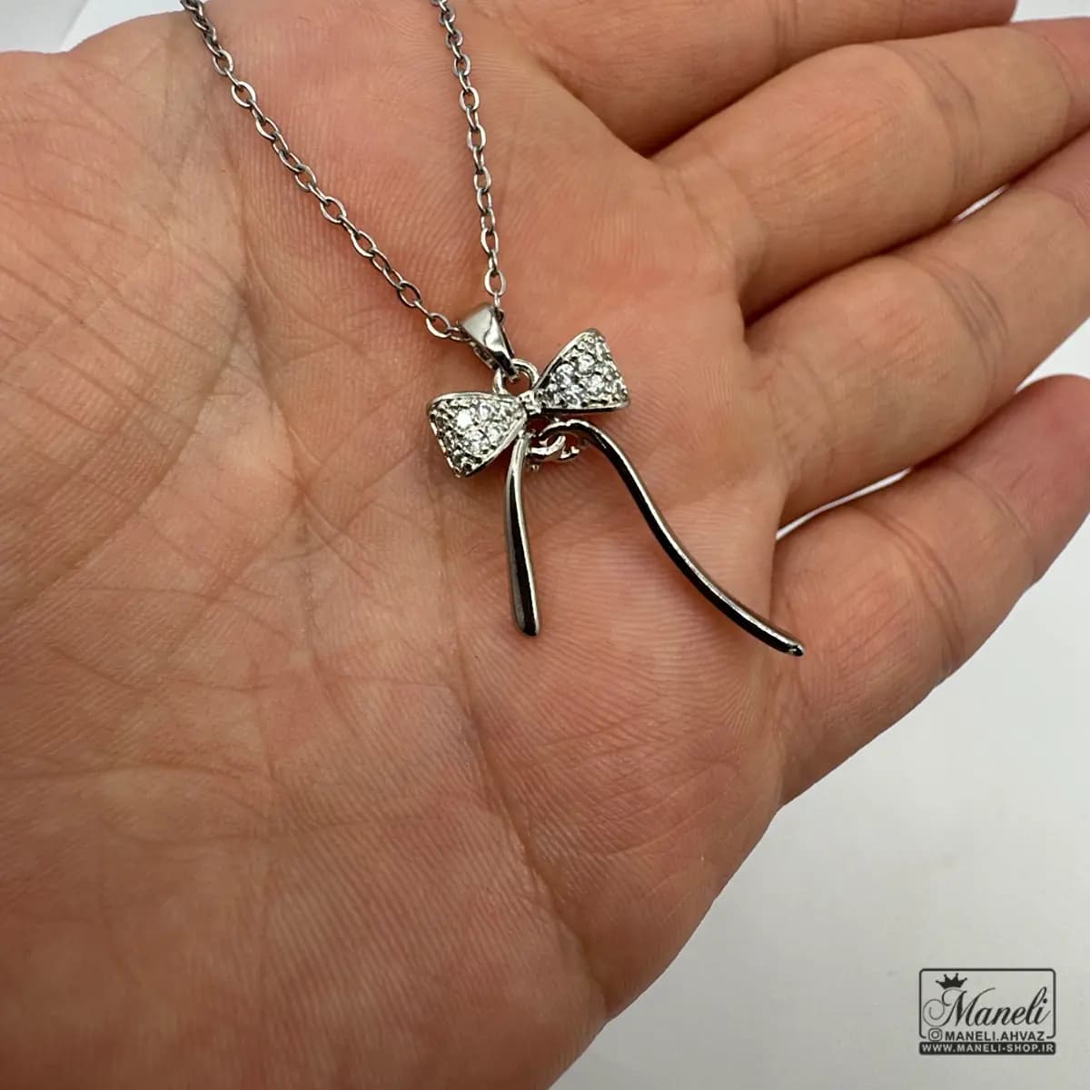 گردنبند نقره ای طرح پاپیون سیلور — تصویر ۳