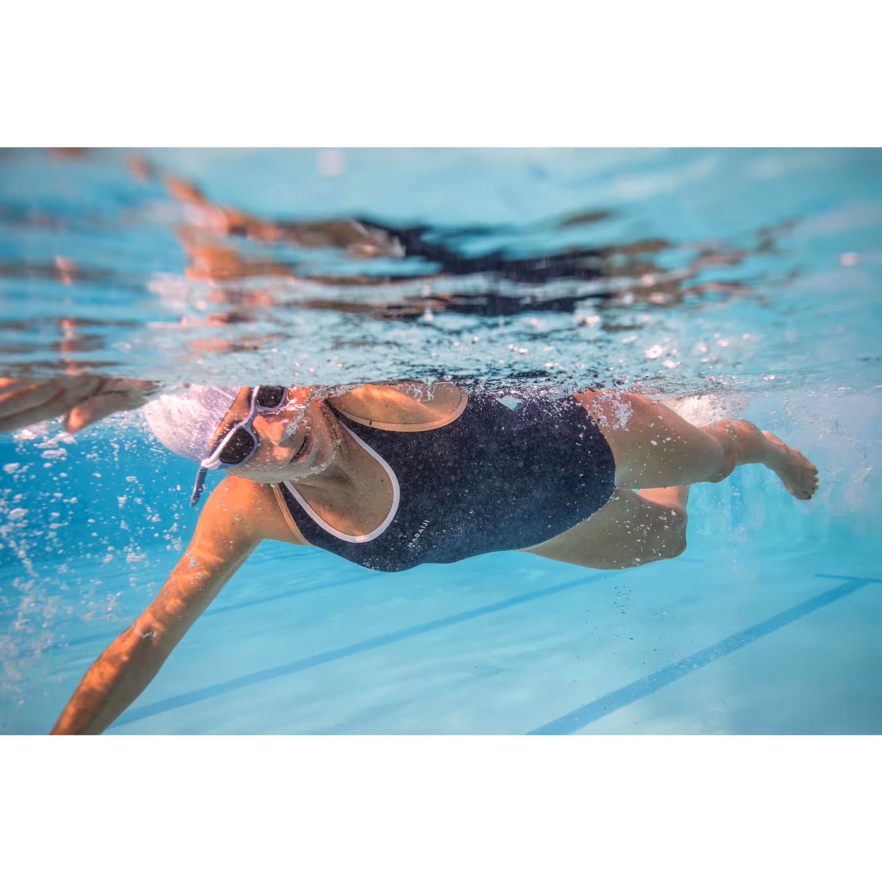 عینک شنا نابایجی – دکتلون Nabaiji Swimming Goggles – Small Size – Blue/Purple – Clear Lenses – Spirit — تصویر ۸