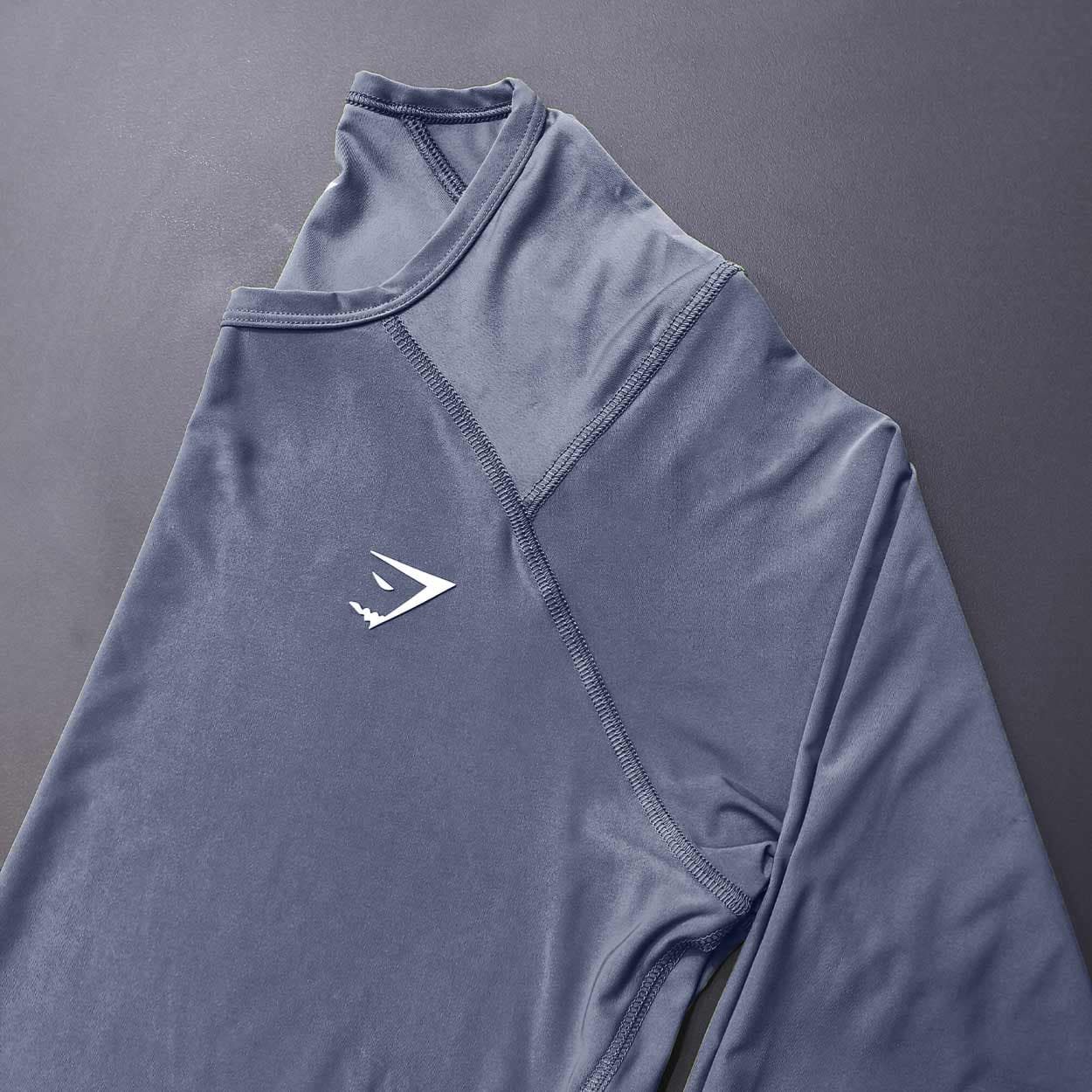 بلوز استرج ورزشی زنانه جیم شارک gymshark مدل برش دار کد 401685 — تصویر ۲