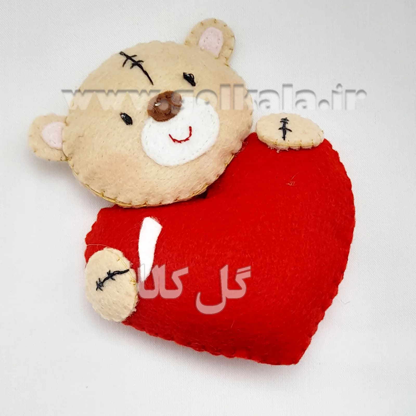 عروسک خرس ولنتاین نمدی قلب‌بغل ۱۵ سانتی گل کالا
