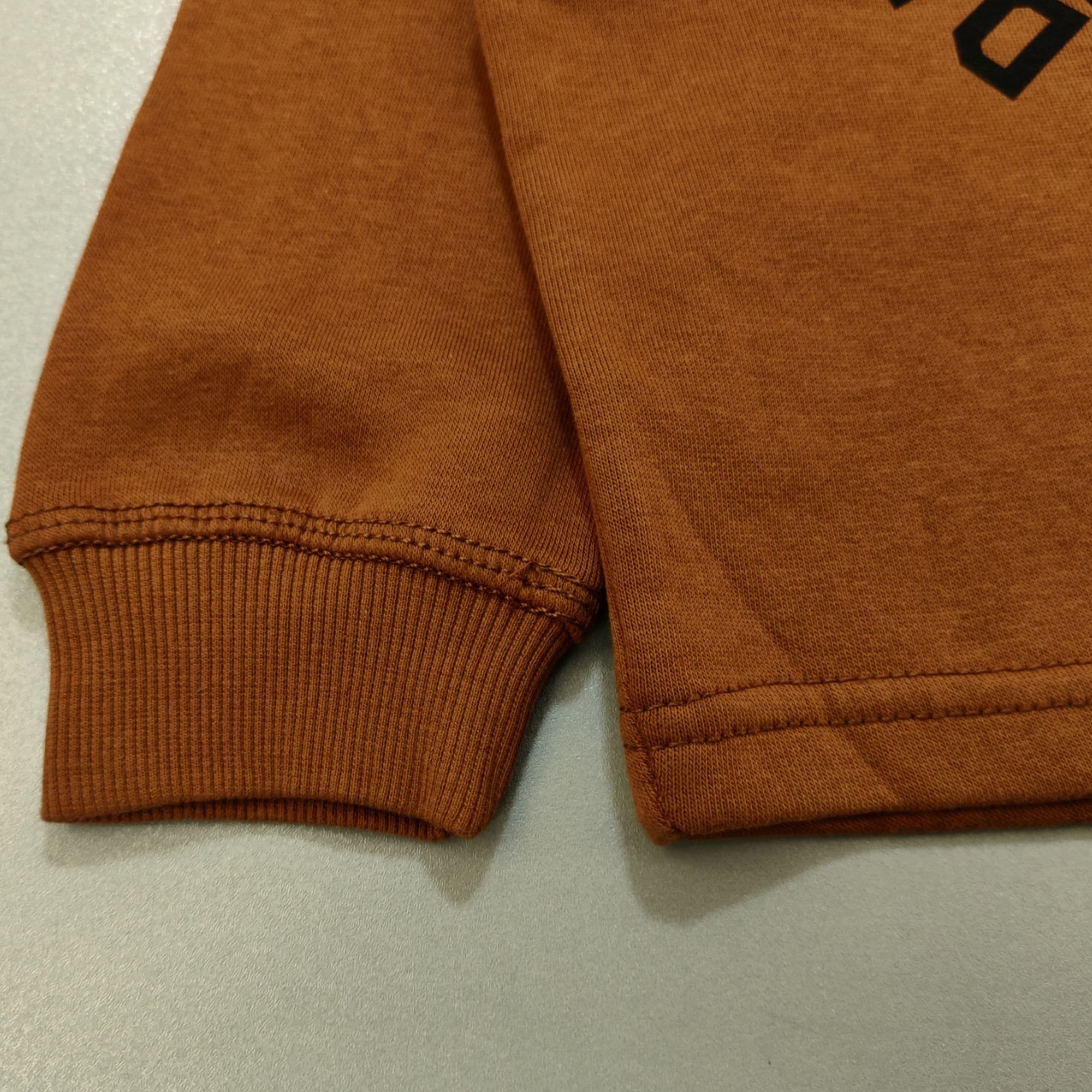 هودی آجری تیرکس H&M — تصویر ۷