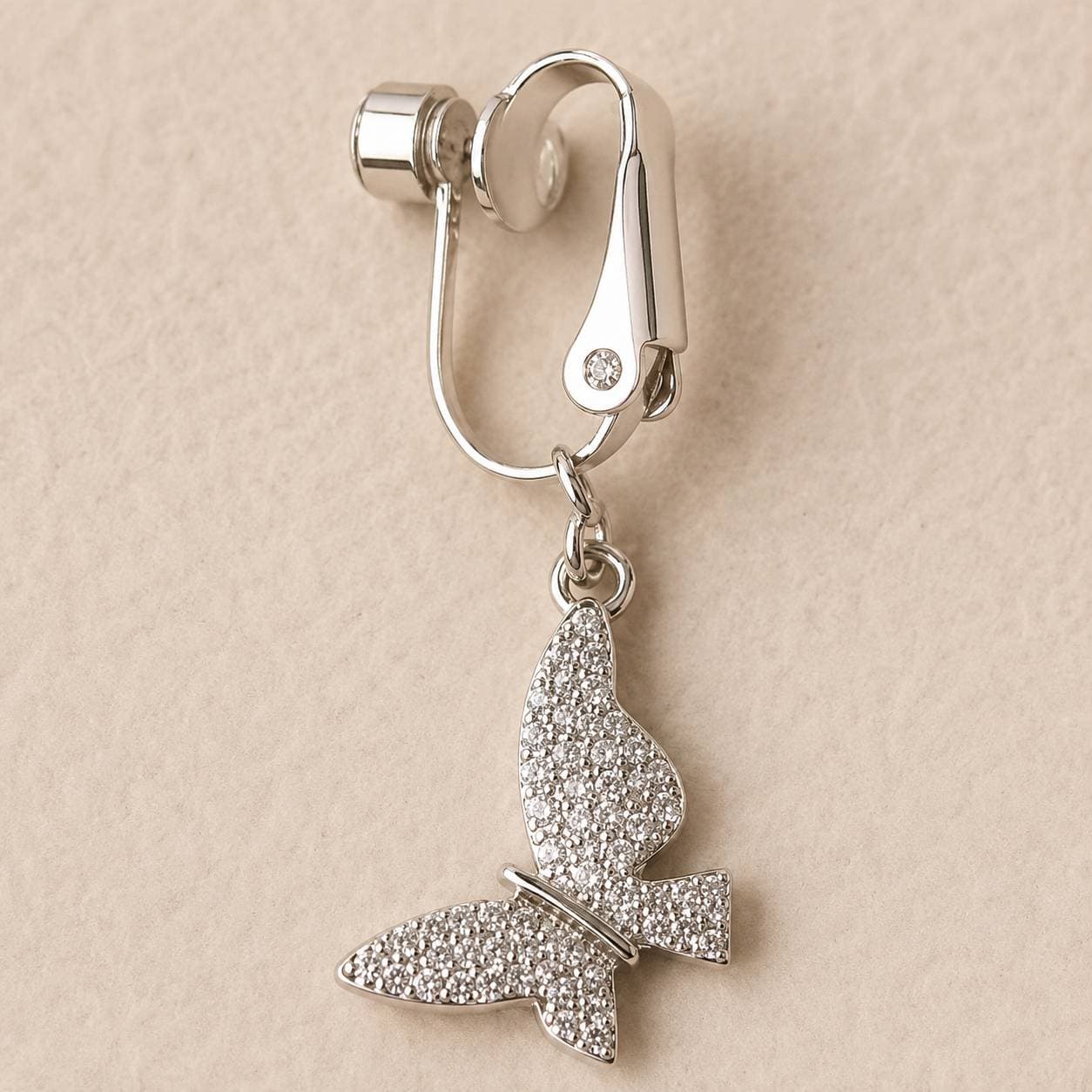 پیرسینگ فیک ناف پروانه‌ای نگین‌دار نقره‌ای