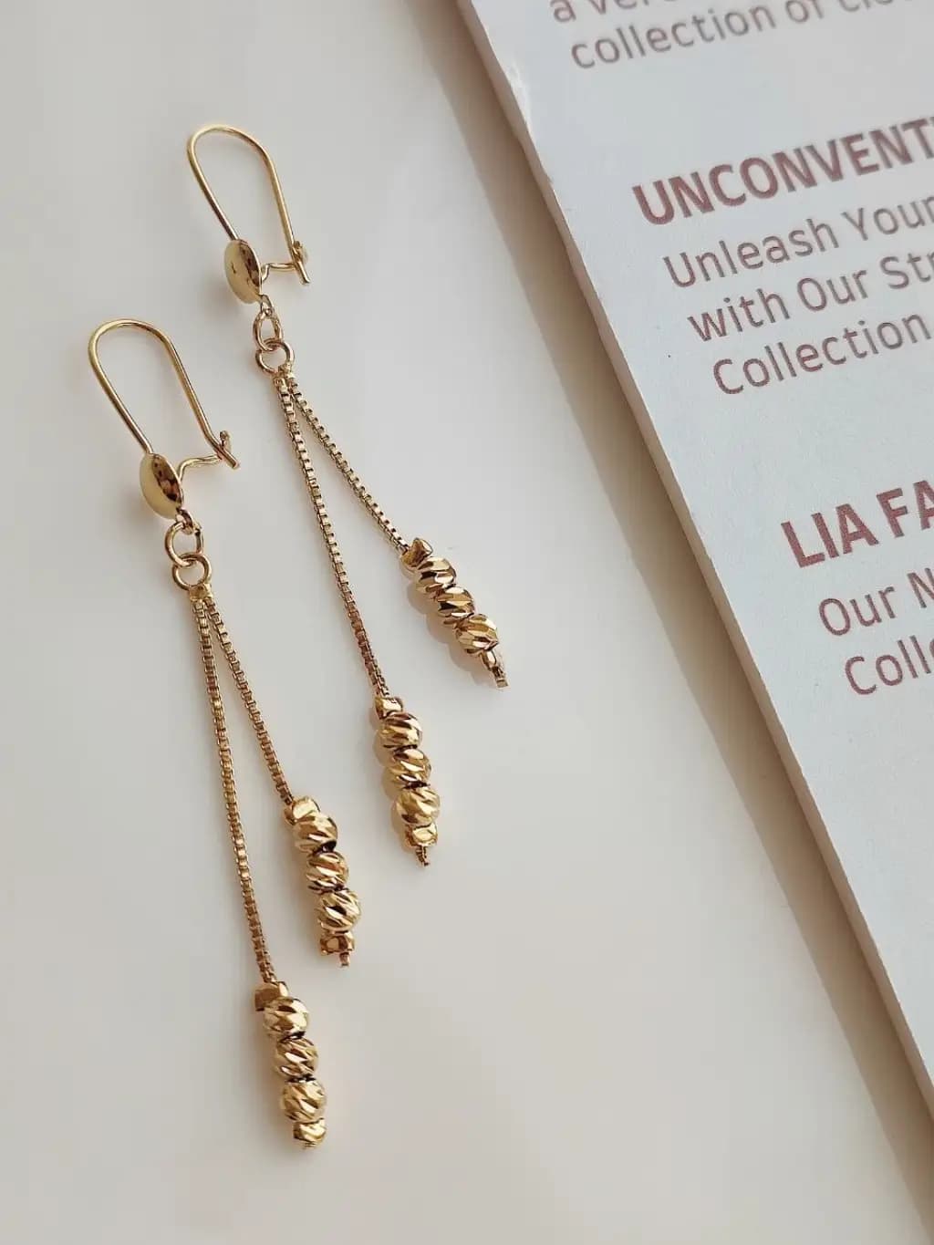 گوشواره آویز توپی City Gold — تصویر ۳