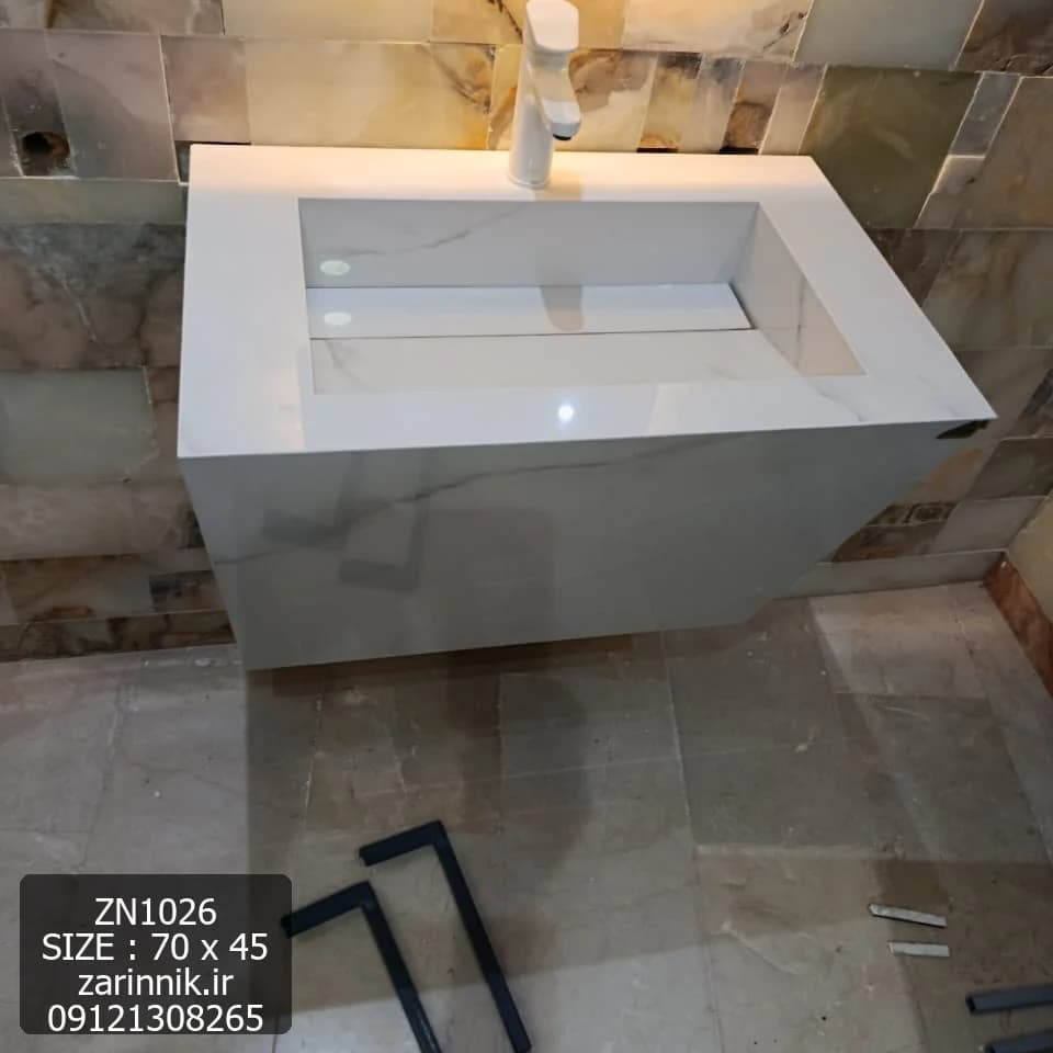 روشویی سرامیکی ساده دیواری 45×70 سفید طرح سنگ زرین نیک کد ZN1025 — تصویر ۳
