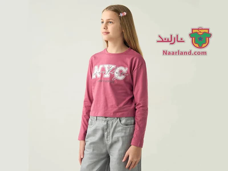 تیشرت کراپ آستین بلند نخی برند Juniors صورتی تیره طرح NYC