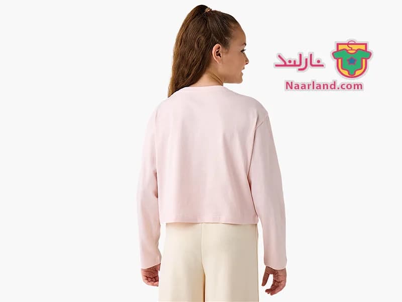 تیشرت کراپ آستین بلند نخی برند Juniors صورتی پولک دار طرح پروانه — تصویر ۵