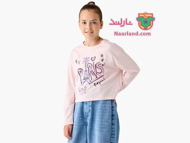 تیشرت کراپ آستین بلند نخی برند Juniors صورتی روشن طرح Paris