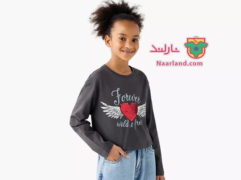 تیشرت کراپ آستین بلند نخی برند Juniors طوسی طرح پولک برگردان قلب