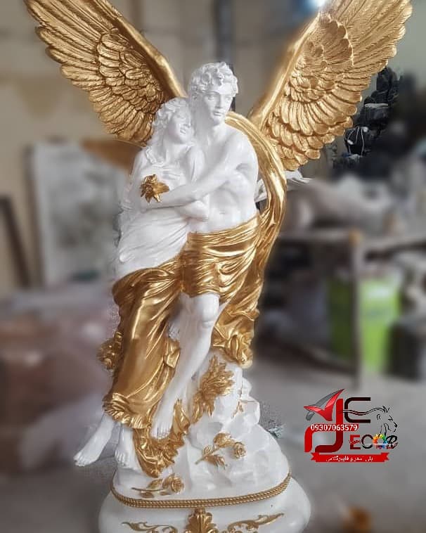مجسمه آدم و حوا بالدار کوچک — تصویر ۵