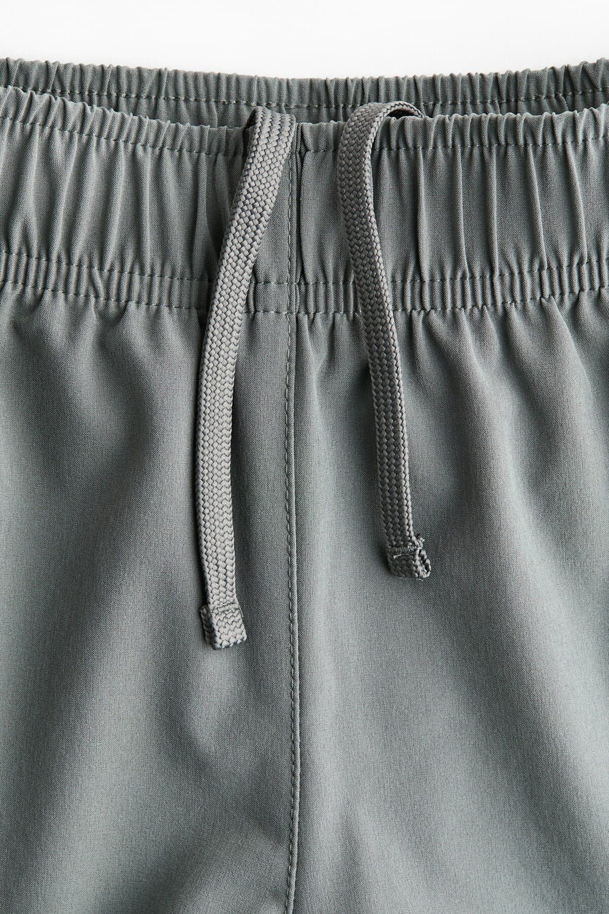 شورت ورزشی اچ اند ام دخترانه پلی استر خاکستری راسته Relaxed/ریلکس فاق نرمال Relaxed/ریلکس اسپرت | H&M 1259347 ID — تصویر ۲