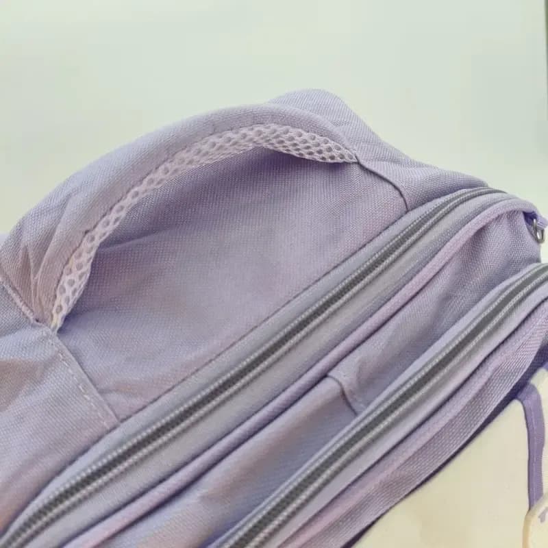 کوله پشتی لبوبو دخترانه اورجینال وارداتی برزنتی ضدآب با آویز سیلیکونی ابعاد 40x15x40 سانتی متر — تصویر ۷