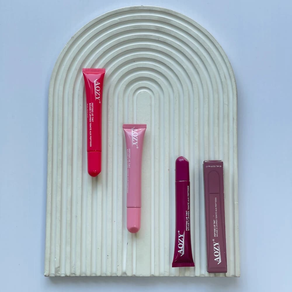 لیپ گلاس حجم‌ دهنده AOZY مدل رود 12 میل | AOZY Plumping Lip Gloss (Road Design)