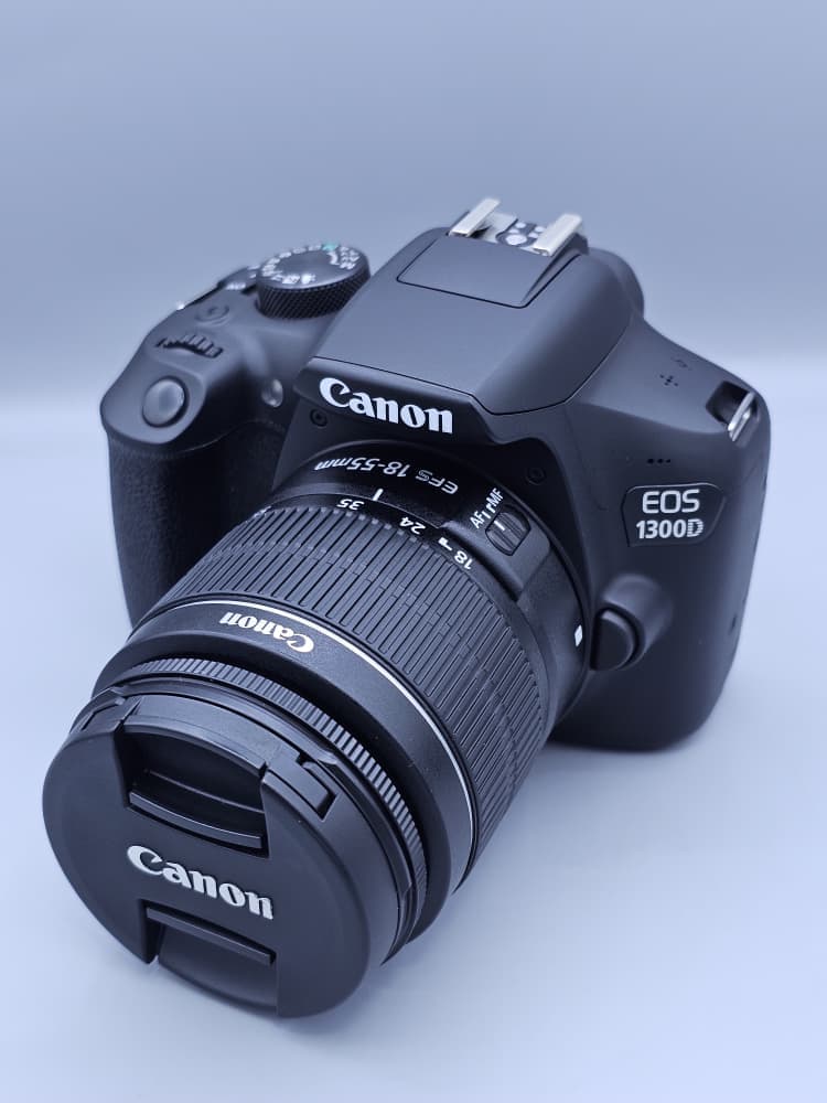 دوربین دست دوم Canon EOS 1300D با لنز 18-55mm III – (1300 شات)