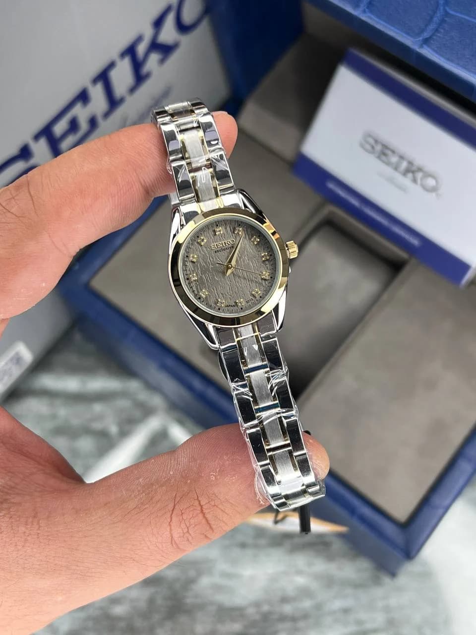 ساعت SEIKO زنانه سیکو اکسکلوسیو مدل 3213 رنگ نقره ای صفحه طوسی
