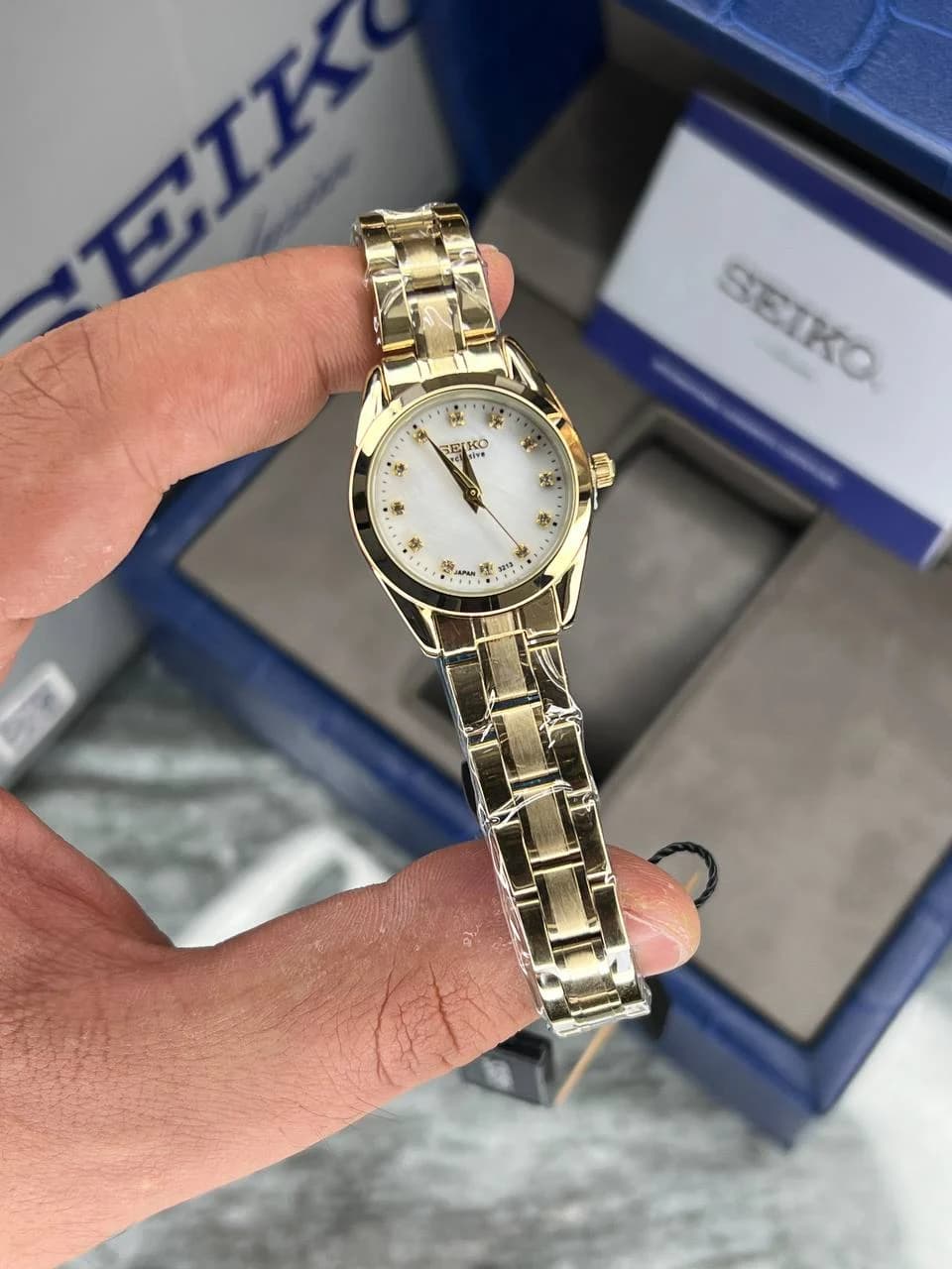 ساعت SEIKO زنانه سیکو اکسکلوسیو مدل 3213 رنگ طلایی صفحه سفید