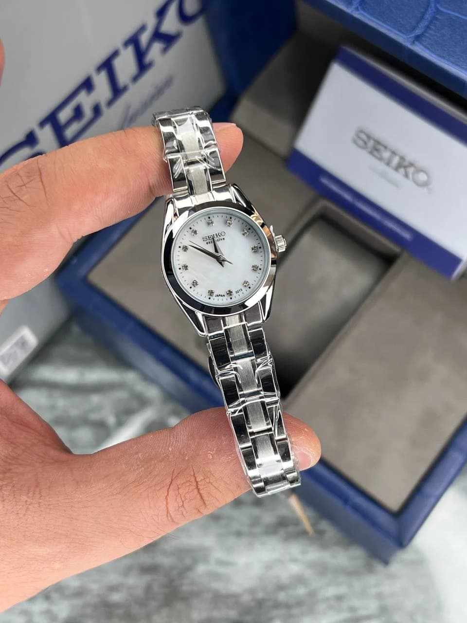 ساعت SEIKO زنانه سیکو اکسکلوسیو مدل 3213 رنگ نقره ای صفحه سفید