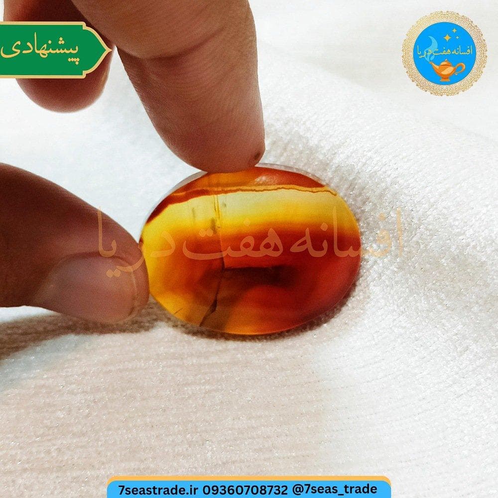 نگین فاخر عقیق سلیمانی بسیار شفاف خطوط لیزری طیف رنگی قرمز نارنجی زرد تراش بیضی بزرگ اندازه ۳.۴۵ در ۲.۶ — تصویر ۴