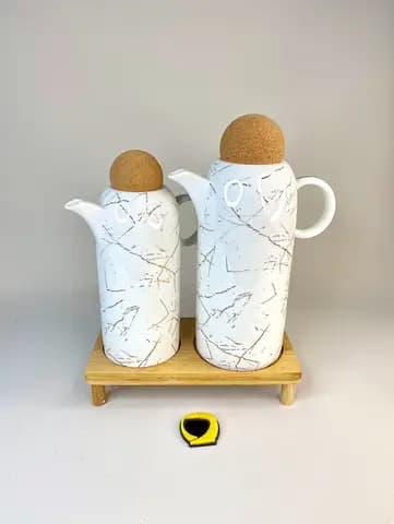 روغن ریز سرامیکی سفید ماربل جفتی در توپی — تصویر ۲