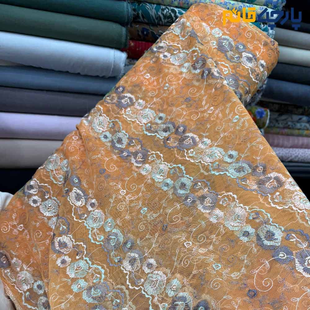 پارچه مجلسی دانتل کره ای زمینه نارنجی متوسط گل رنگی کد8178
