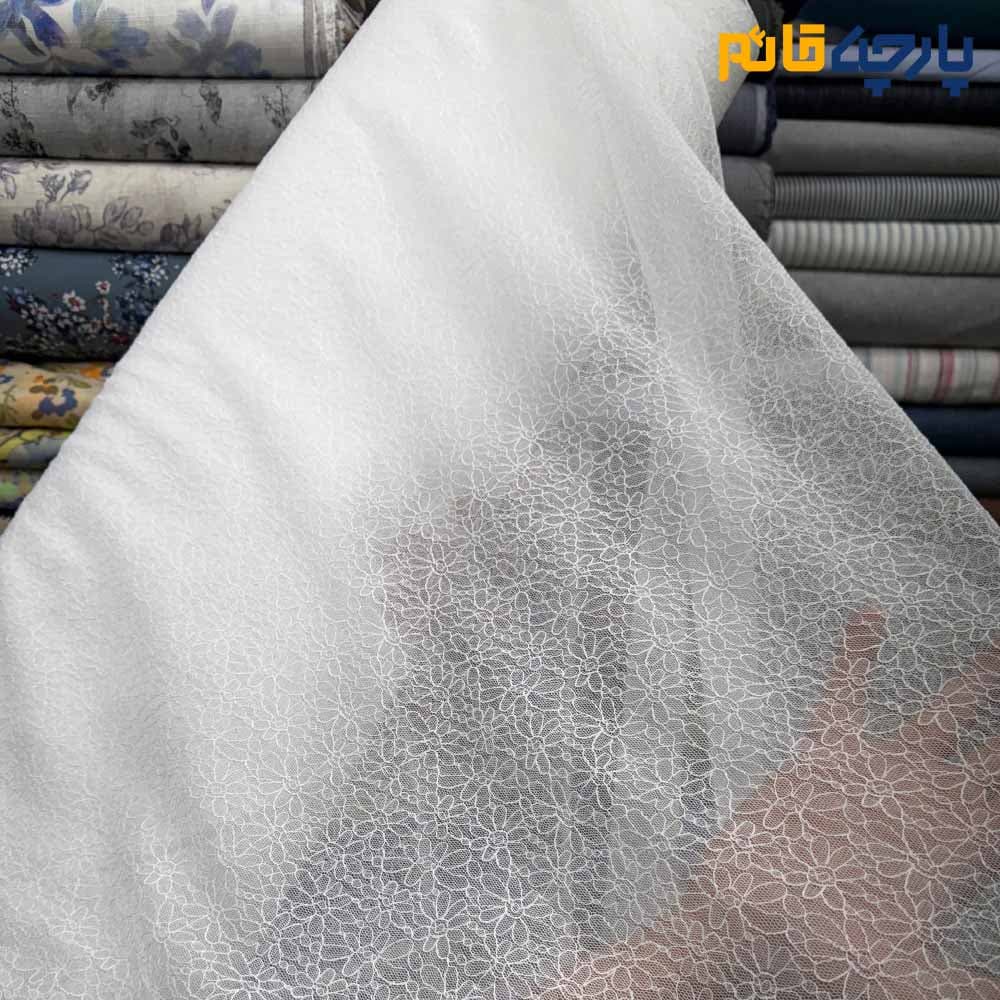 پارچه مجلسی تور کتان ایتالیایی رنگ سفیدطرح گل پر و ریز ظریف کد 7844