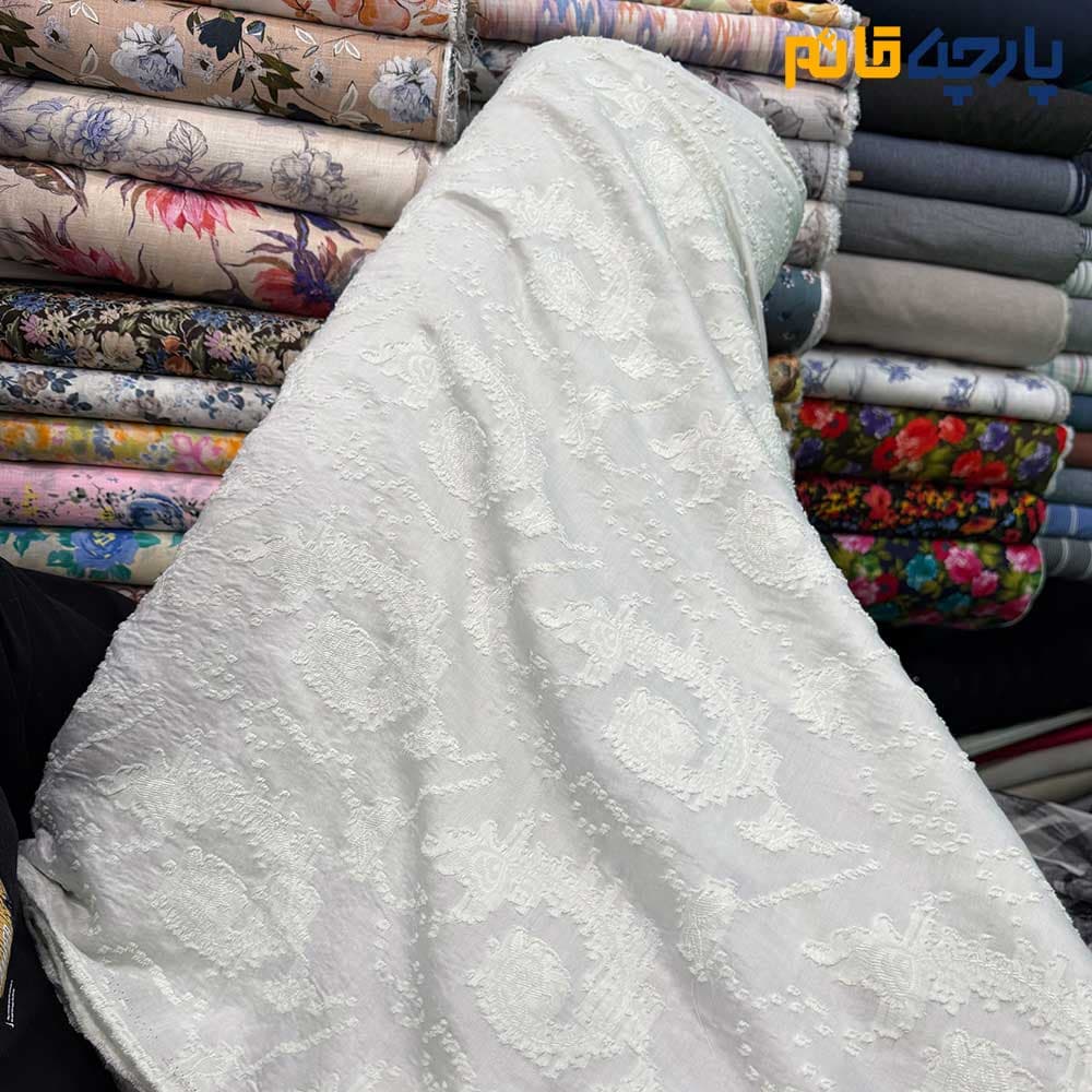 پارچه مجلسی ژاکارد پییس نخ ژاپن طرح اشکی برجسته رنگ سبز نعنایی(مینت) کد۷۵۵۰