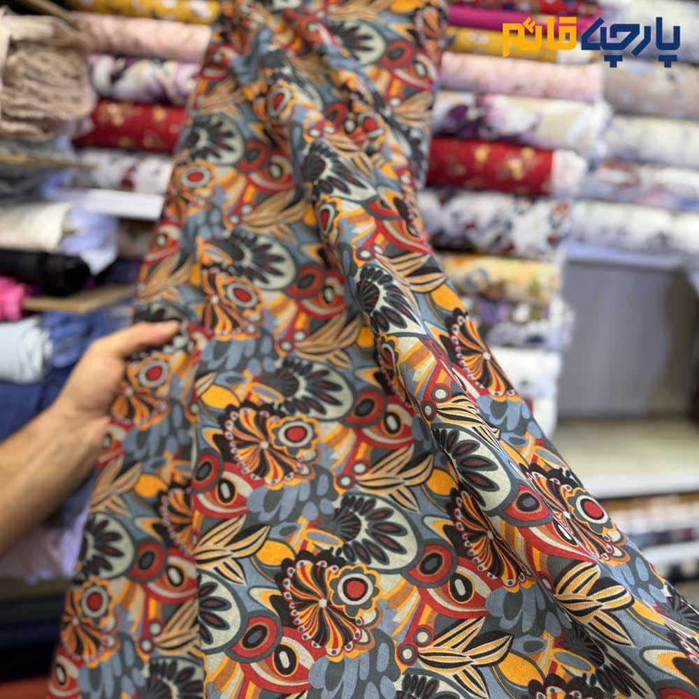 پارچه بهاره و تابستانه وال طرحدار کره ای زمینه نگتیرع طرح نارنجی و آبی کد۷۲۶۲