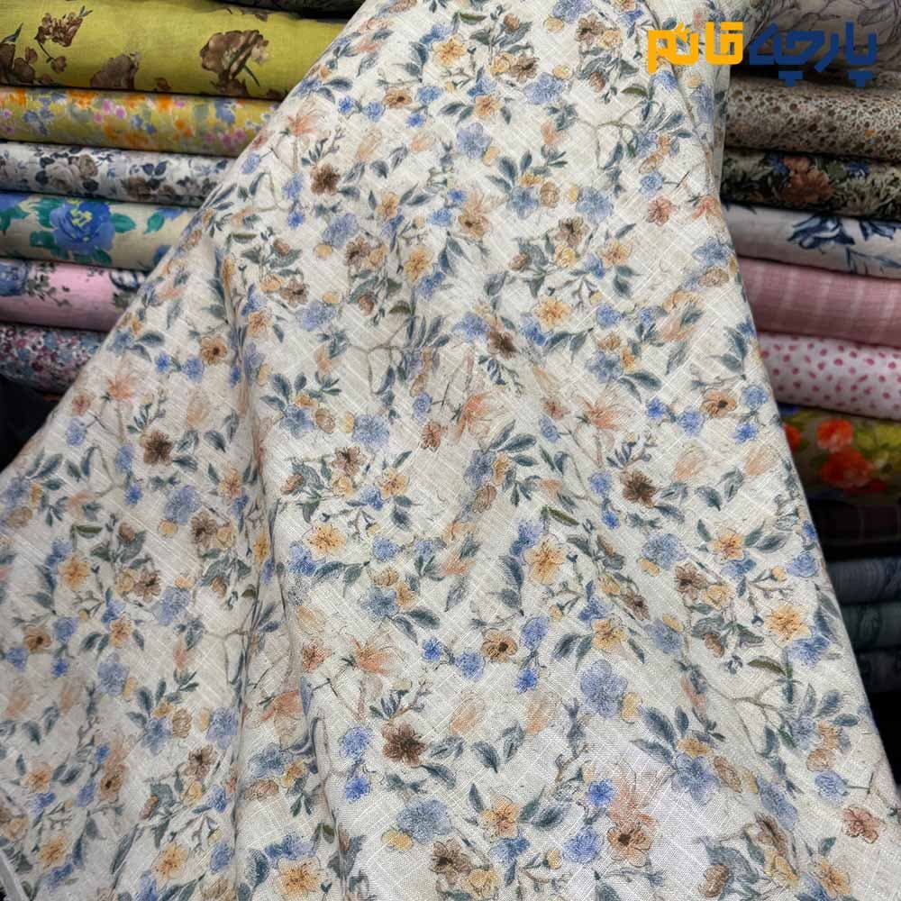 پارچه بهاره تابستانه لینن طرحدار ایتالیایی زمینه کرم شیری گل ریز کد۷۱۲۸