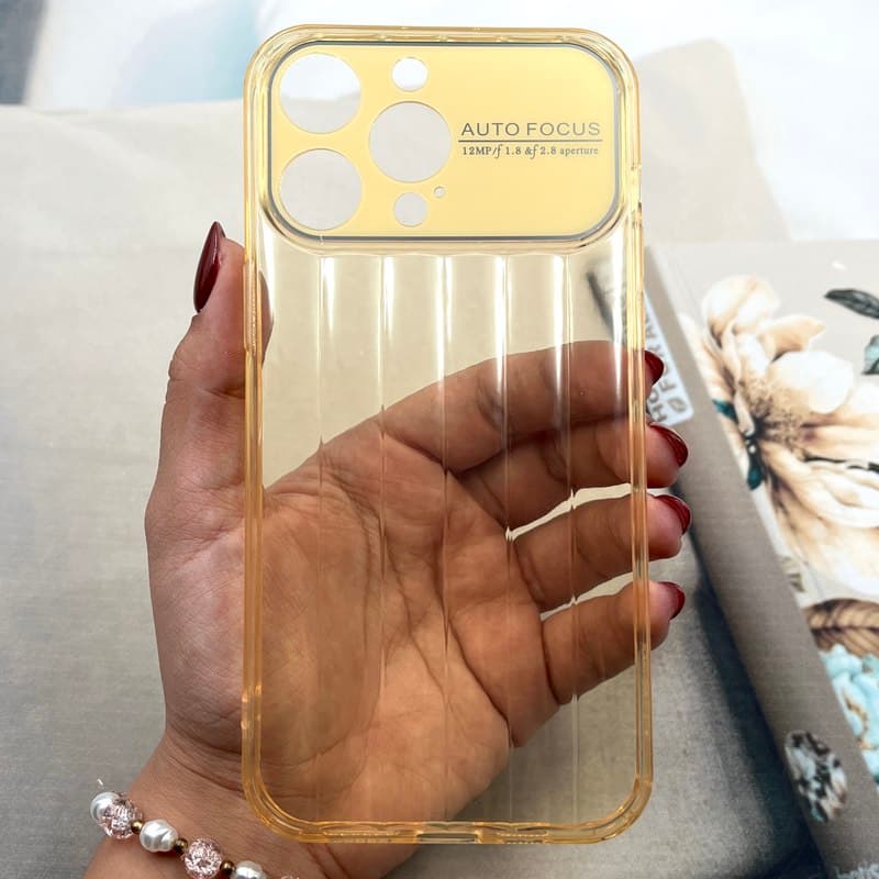 قاب گوشی iPhone 14 Pro Max آیفون Crystal Square سیلیکونی شفاف ضد ضربه کرکره ای محافظ لنز دار طلایی کد 833537