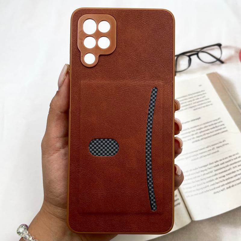 قاب گوشی Galaxy A12 / Galaxy M12 سامسونگ Smart Wallet جاکارتی چرم اورجینال کربن اسپرت محافظ لنز دار عسلی کد 400106
