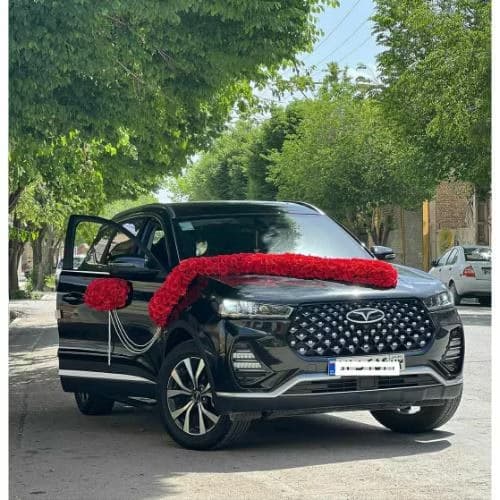 ماشین عروس هایما مشکی تزیین با گل های طبیعی قرمز کد 66
