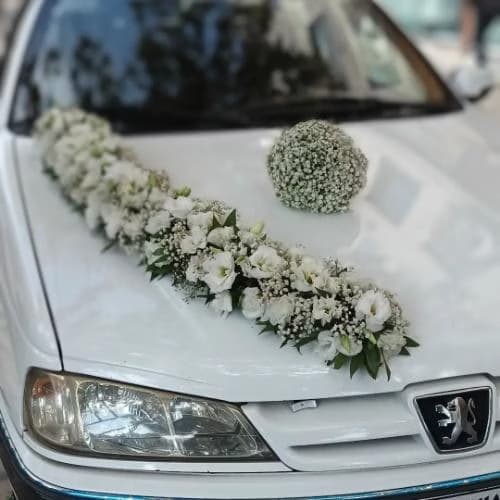 ماشین عروس پژو پارس تزیین با گل های طبیعی کد 62 — تصویر ۲