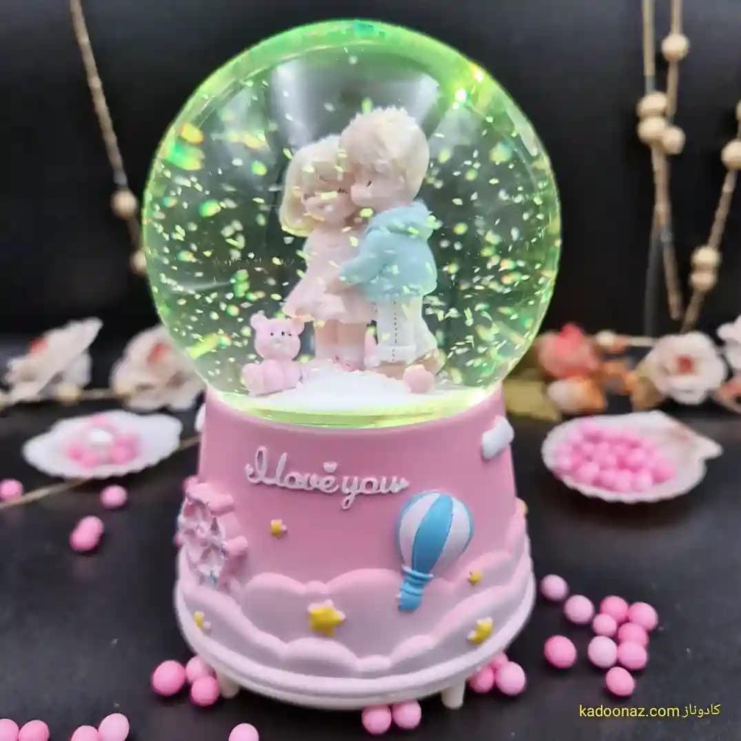 گوی شیشه ای بزرگ موزیکال پمپی برفی با شش طیف نوری طرح I Love You رنگ صورتی