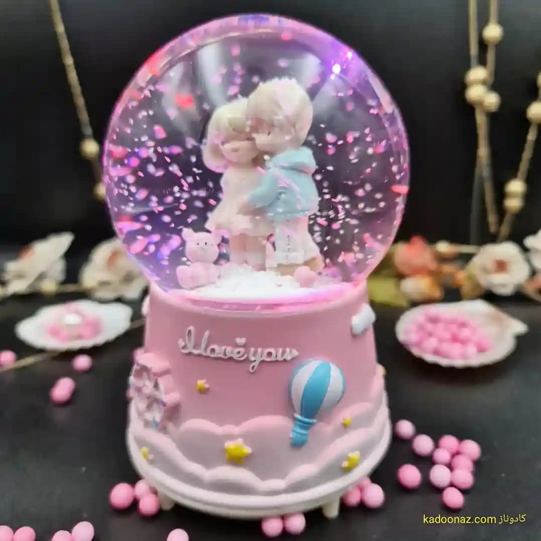 گوی شیشه ای بزرگ موزیکال پمپی برفی با شش طیف نوری طرح I Love You رنگ صورتی — تصویر ۶