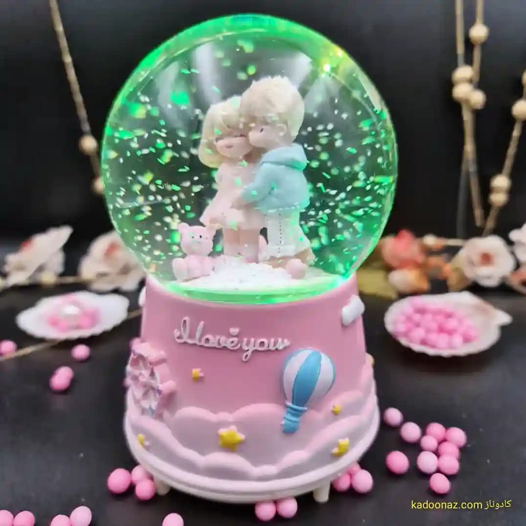 گوی شیشه ای بزرگ موزیکال پمپی برفی با شش طیف نوری طرح I Love You رنگ صورتی — تصویر ۴