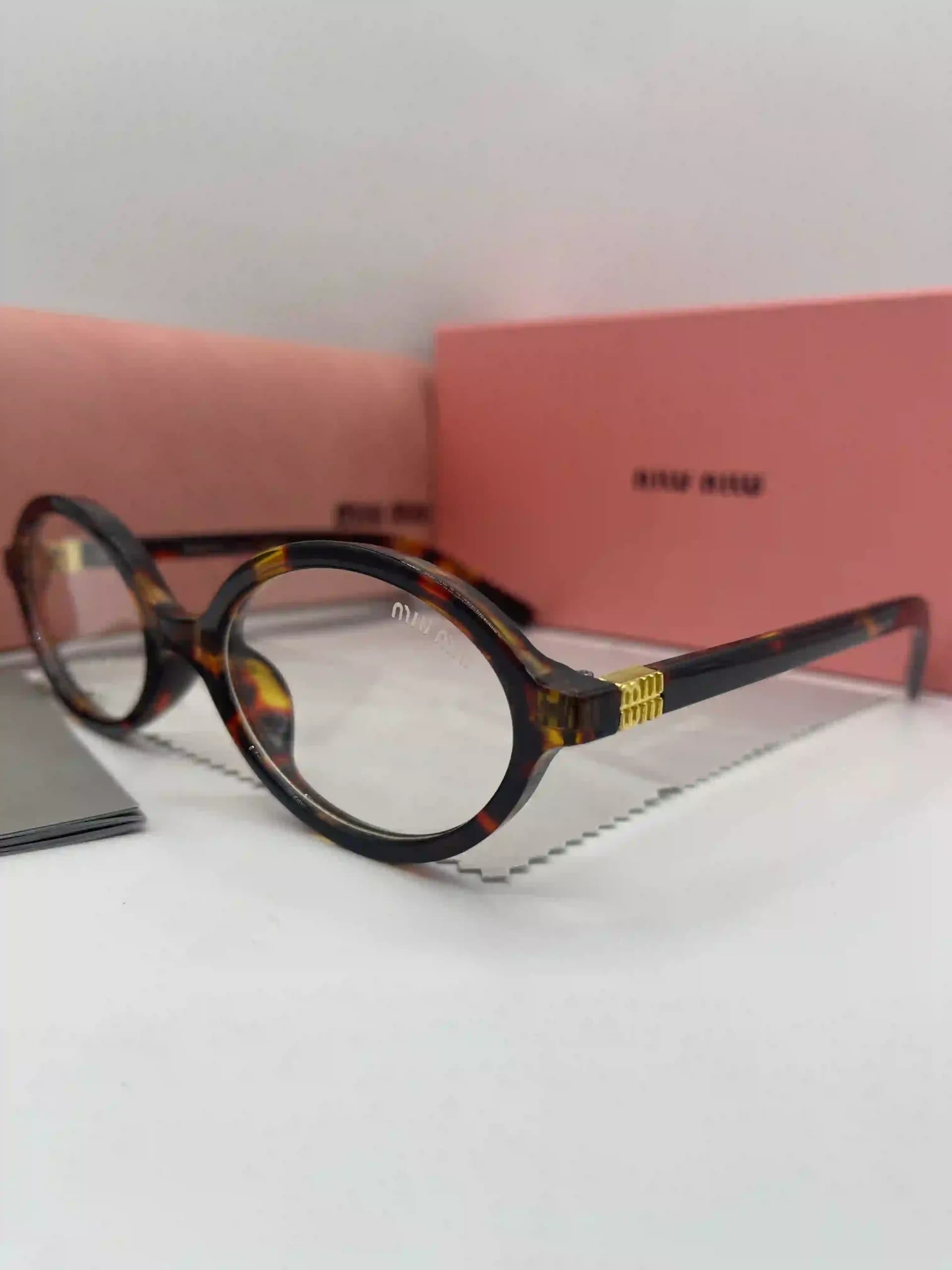 عینک فریم گرد مدل Miu Miu — تصویر ۱۲