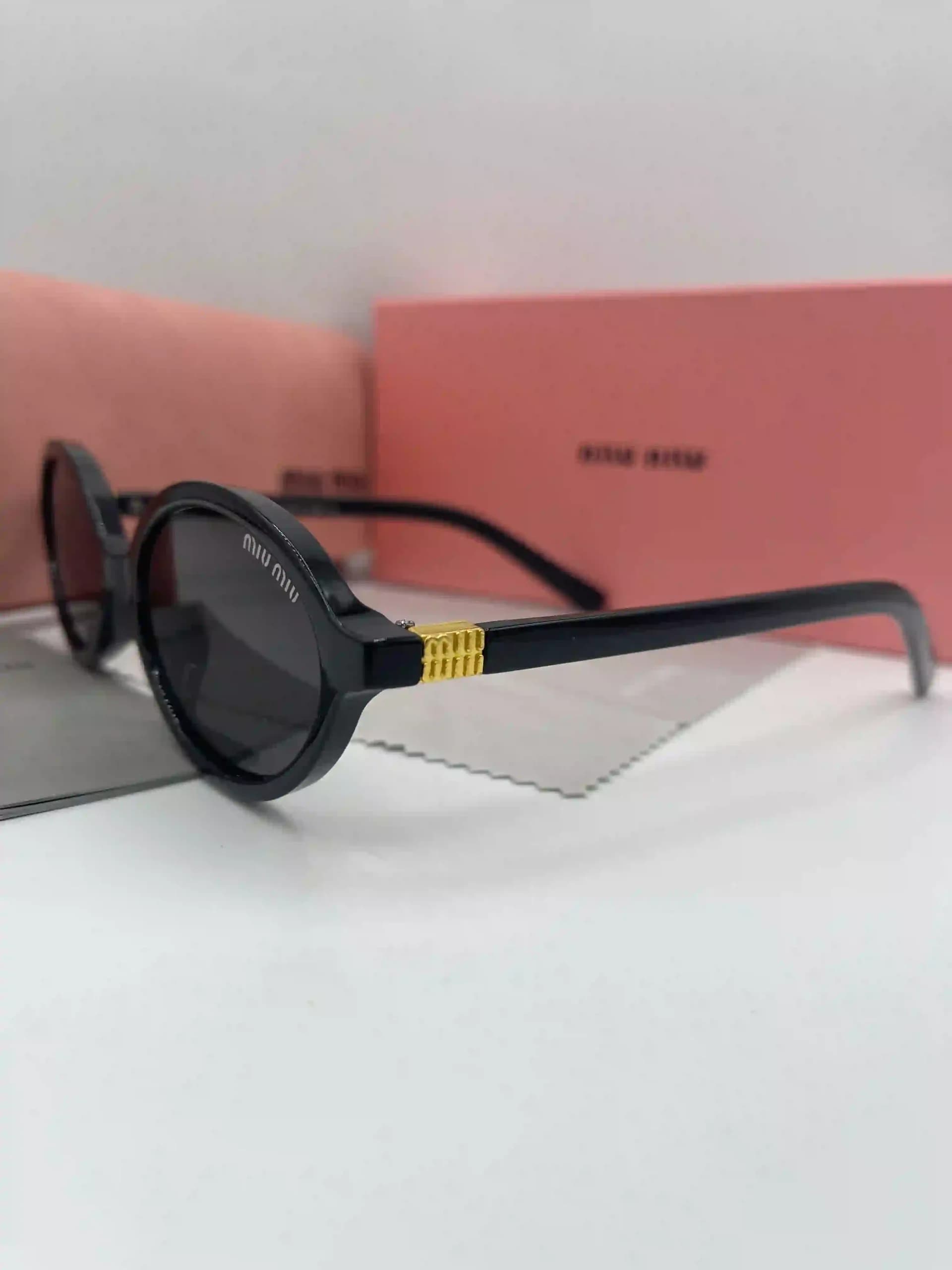 عینک فریم گرد مدل Miu Miu — تصویر ۸