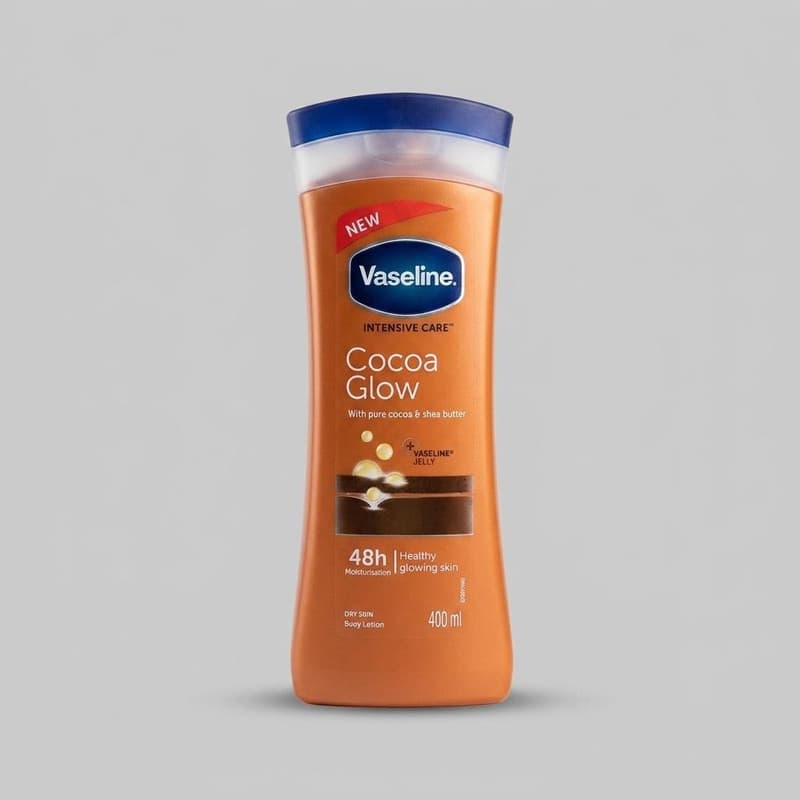 لوسیون بدن وازلین مدل Cocoa Glow حجم 400 میلی‌لیتر نرم کننده و آبرسان پوست خشک و حساس با عصاره کاکائو و شی باتر، حاوی ویتامین E، حفظ نرمی و لطافت پوست و جلوگیری از خشکی و خارش