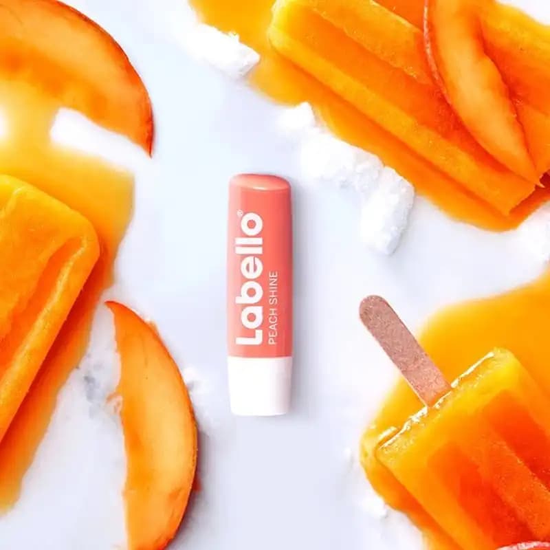 بالم لب لابلو Labello مدل Shine Peach طعم هلو — تصویر ۳