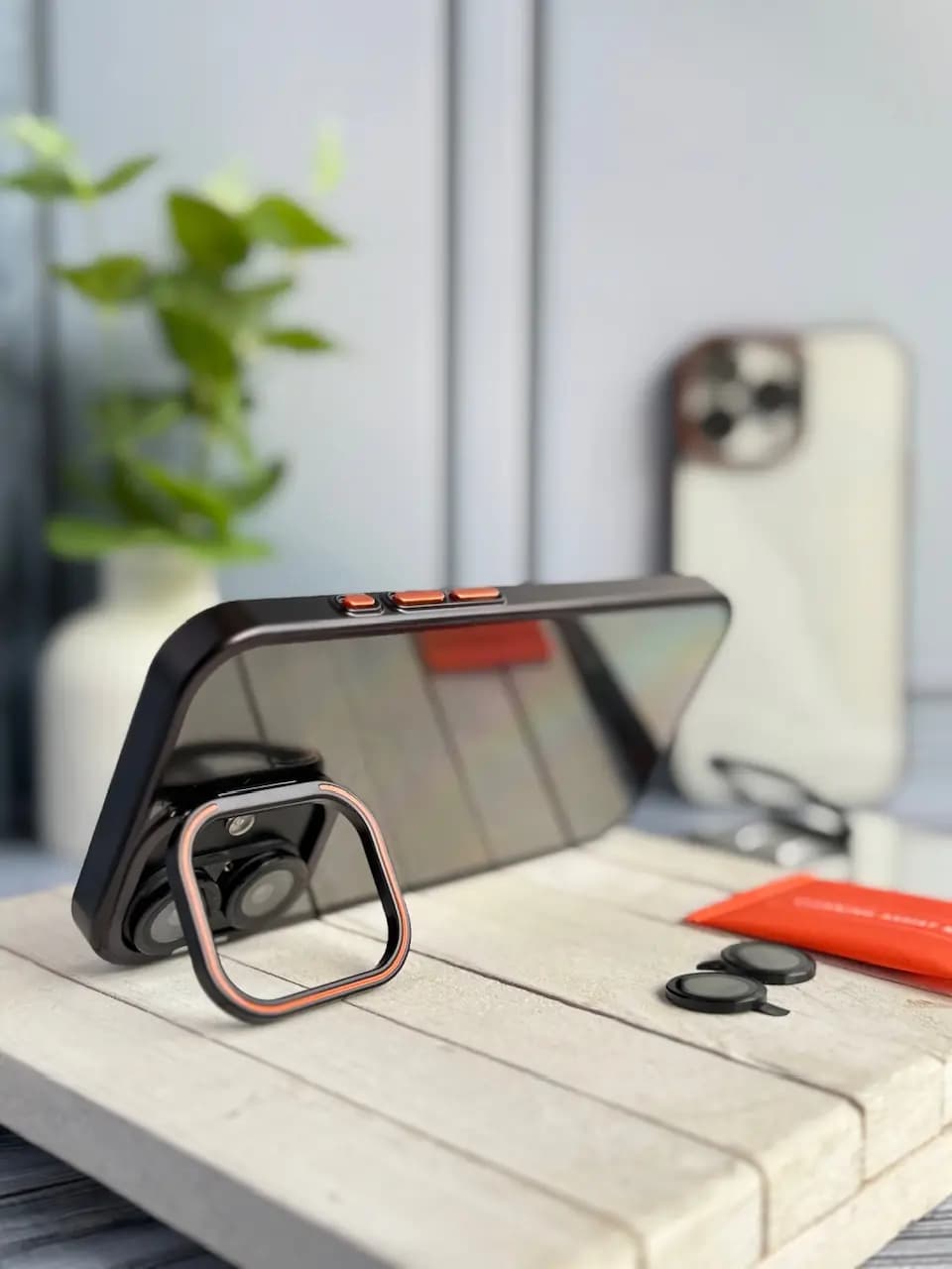 قاب orange lens استند شو با محافظ لنز — تصویر ۲
