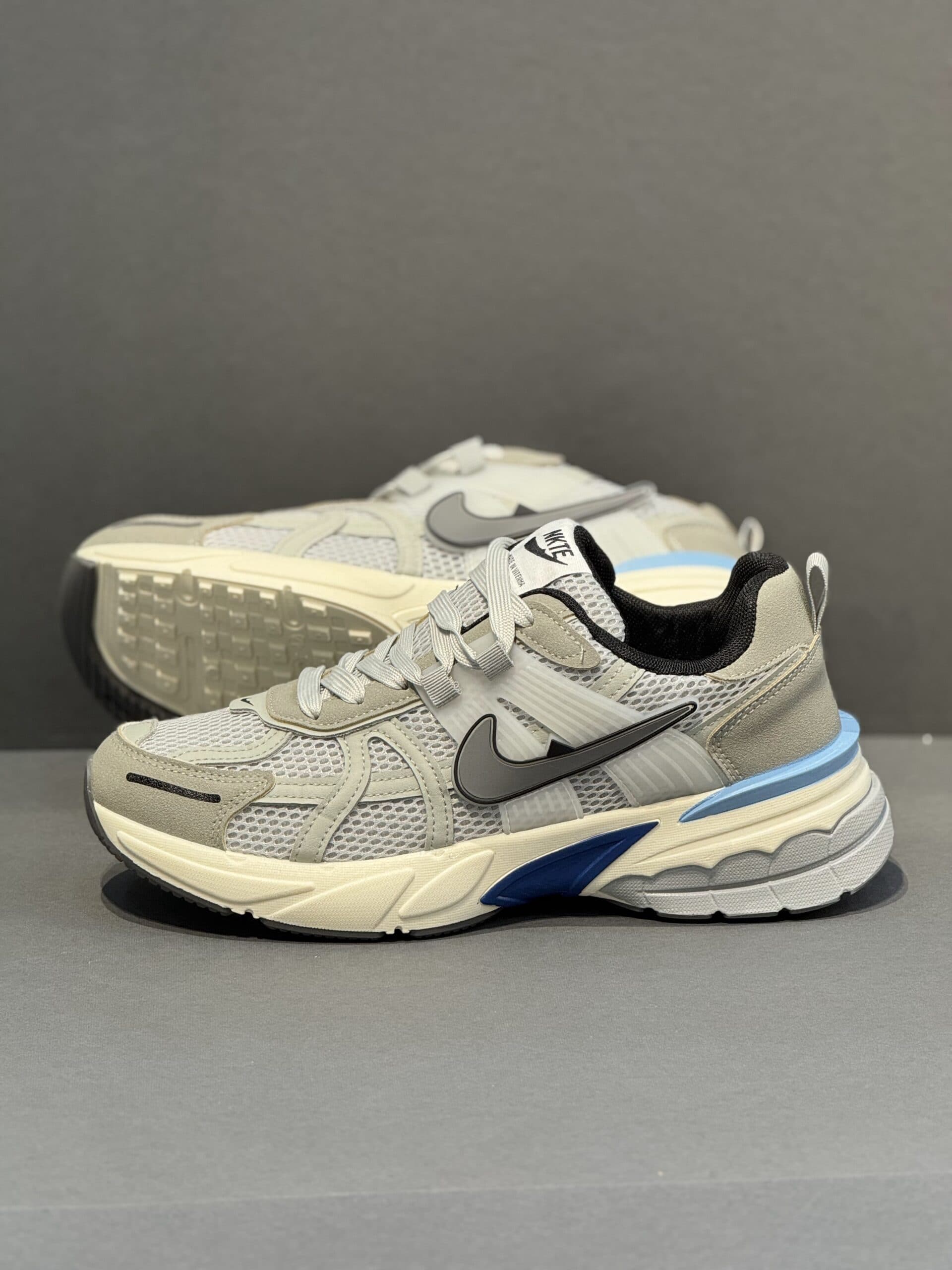 کتونی نایک وی تو کی کرم سرمه ایNike V2K Run in cream and navy