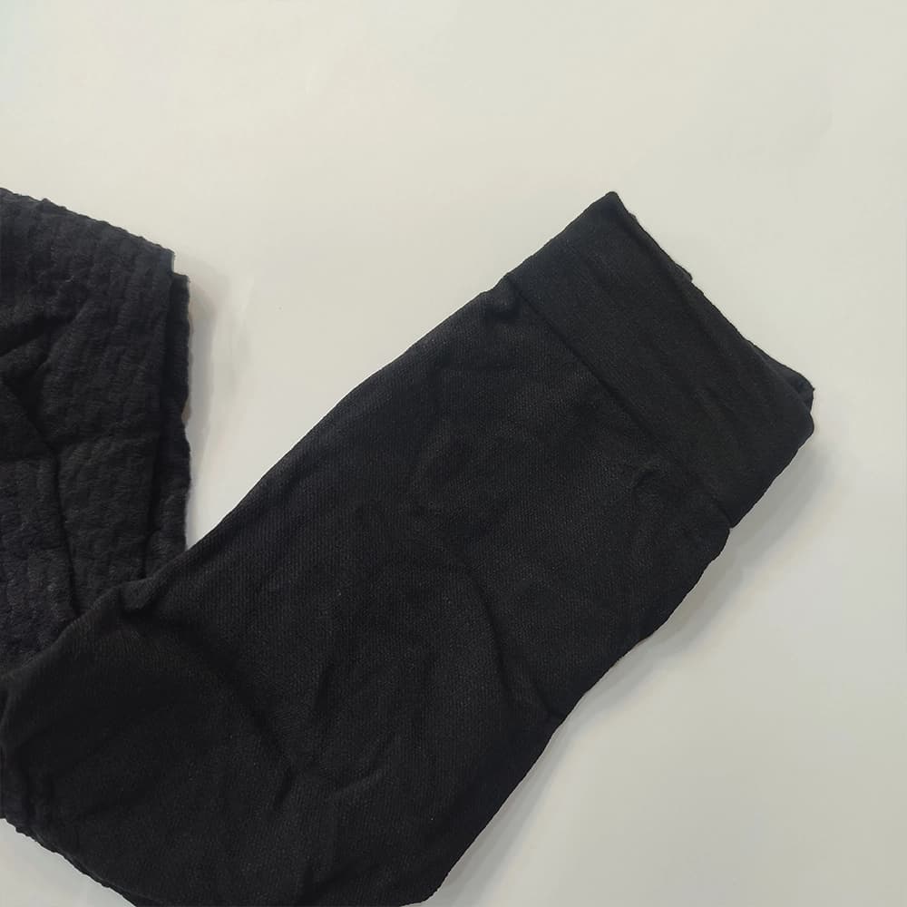 جوراب شلواری مشکی طرح برجسته — تصویر ۳