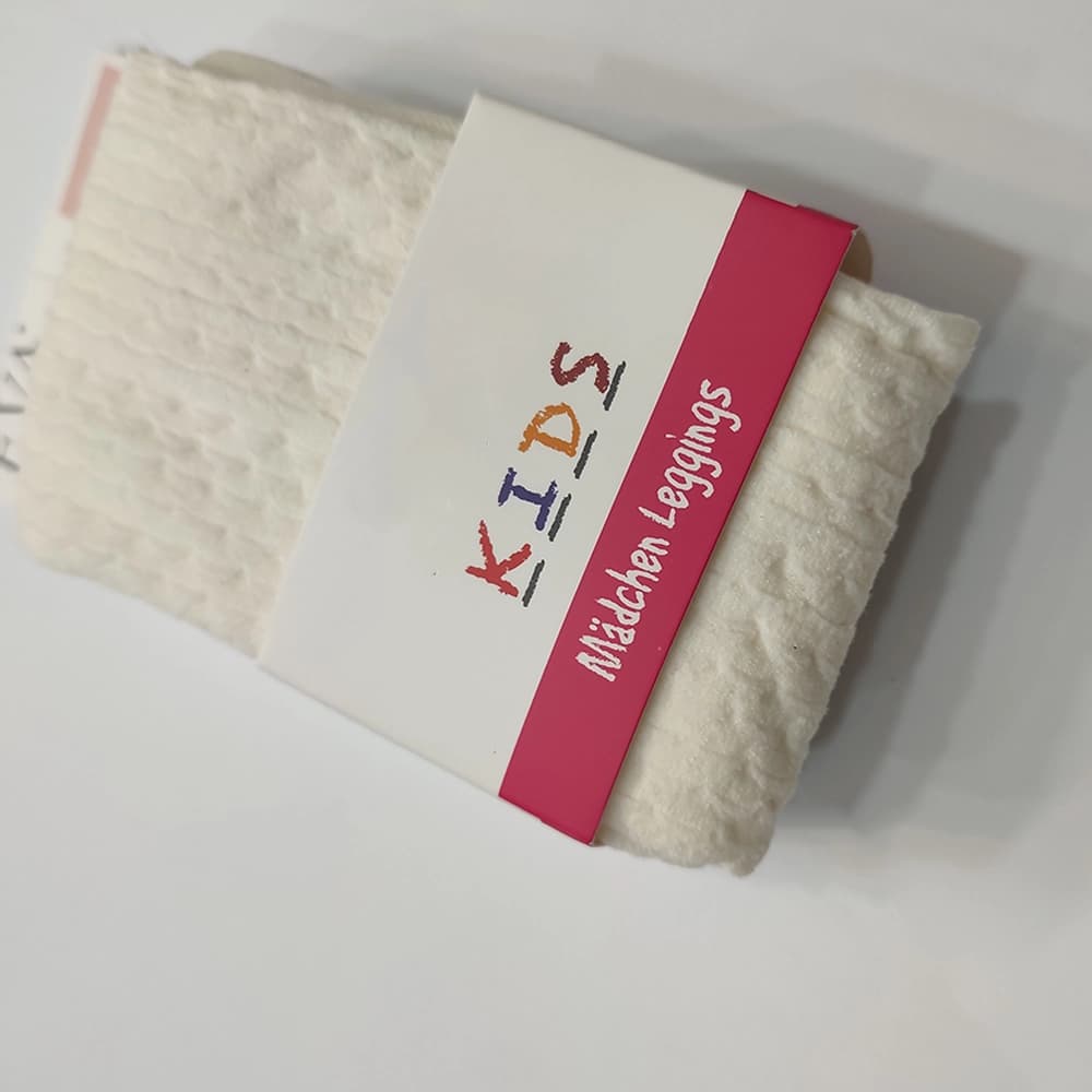 جوراب شلواری شیری طرح برجسته — تصویر ۵