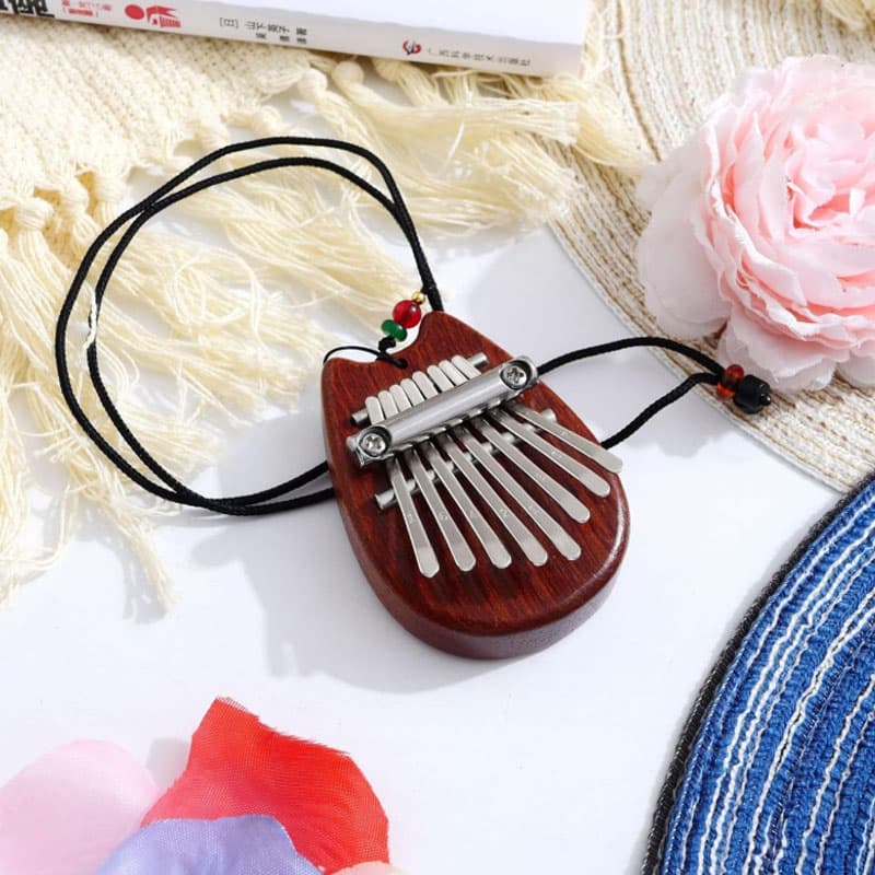 کالیمبا 7 نت طرح گربه کوچک جیبی چوبی و شفاف — تصویر ۶