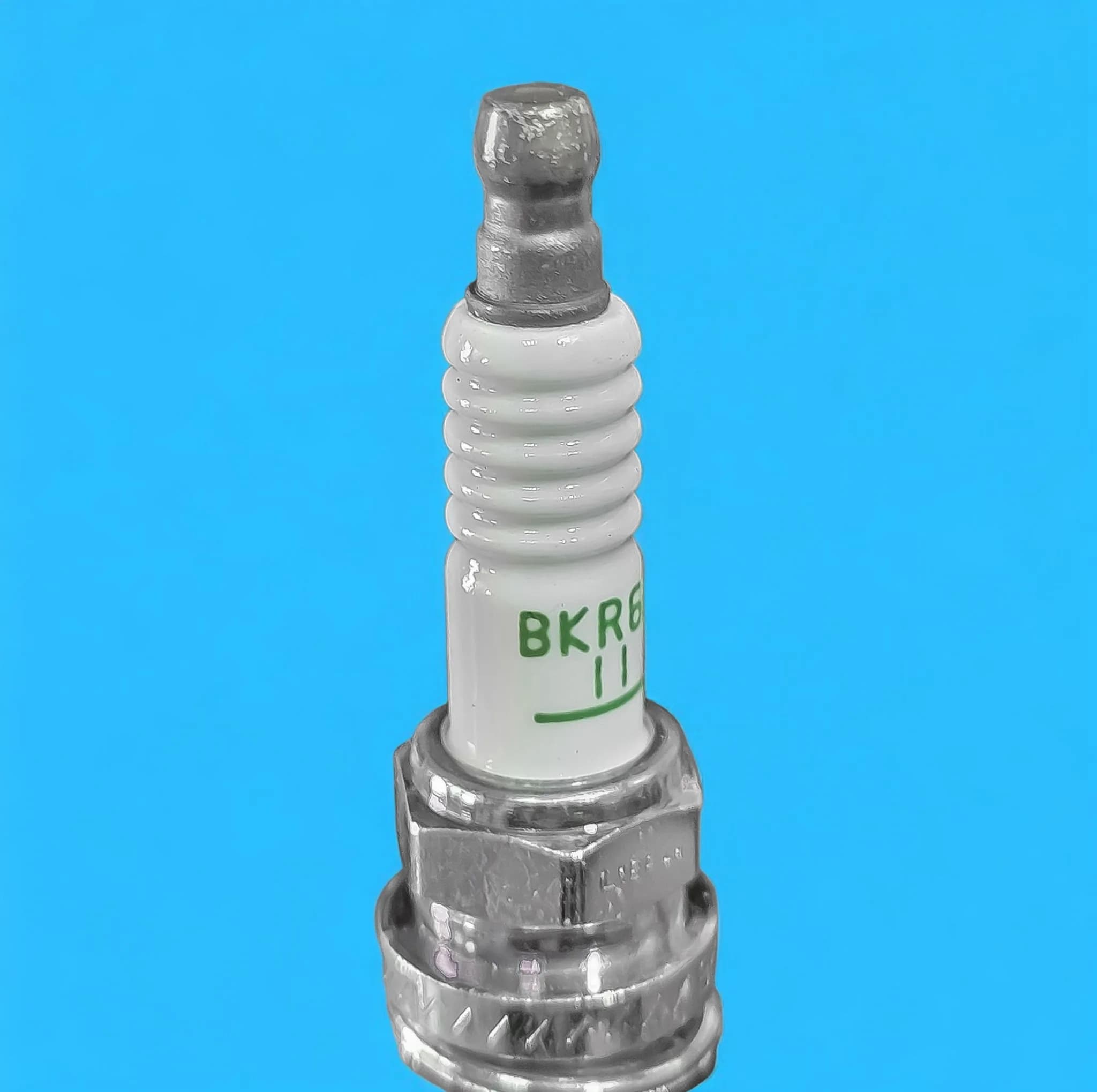 شمع خودرو ان جی کی مدل XU7.XU7P.XUM کد BKR6E11 پایه کوتاه مناسب برای پژو ۴۰۵ ، پارس ، آریسان ۲ بسته ۴ عددی — تصویر ۲