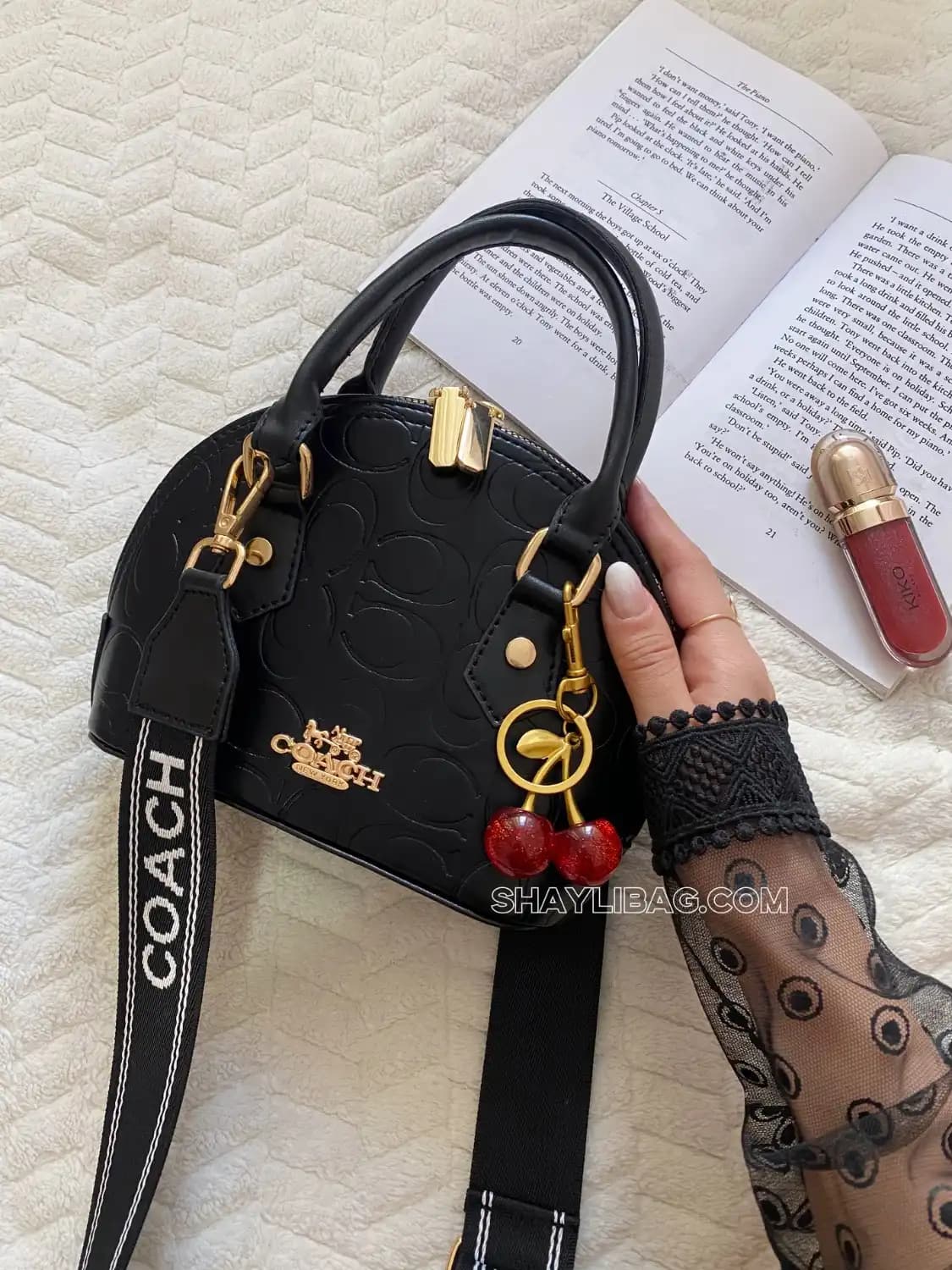 کیف دستی و دوشی زنانه مدل کوچ مشکی
