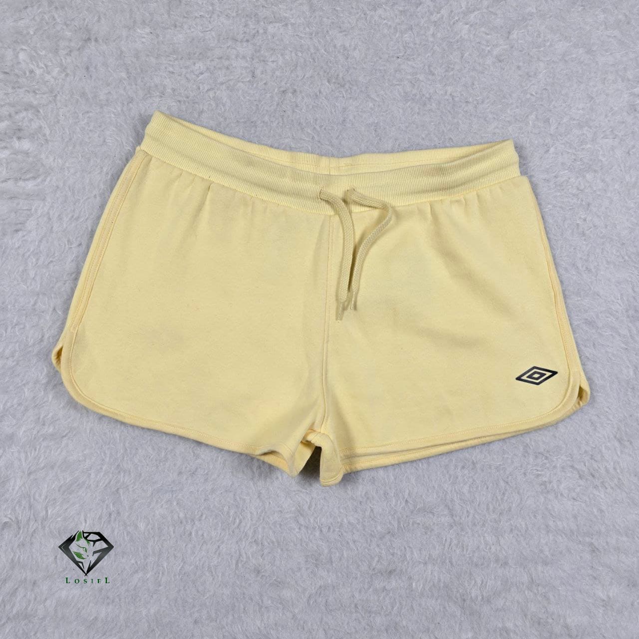 شورتک ورزشی تو کرکی زنانه برند umbro کد WE341