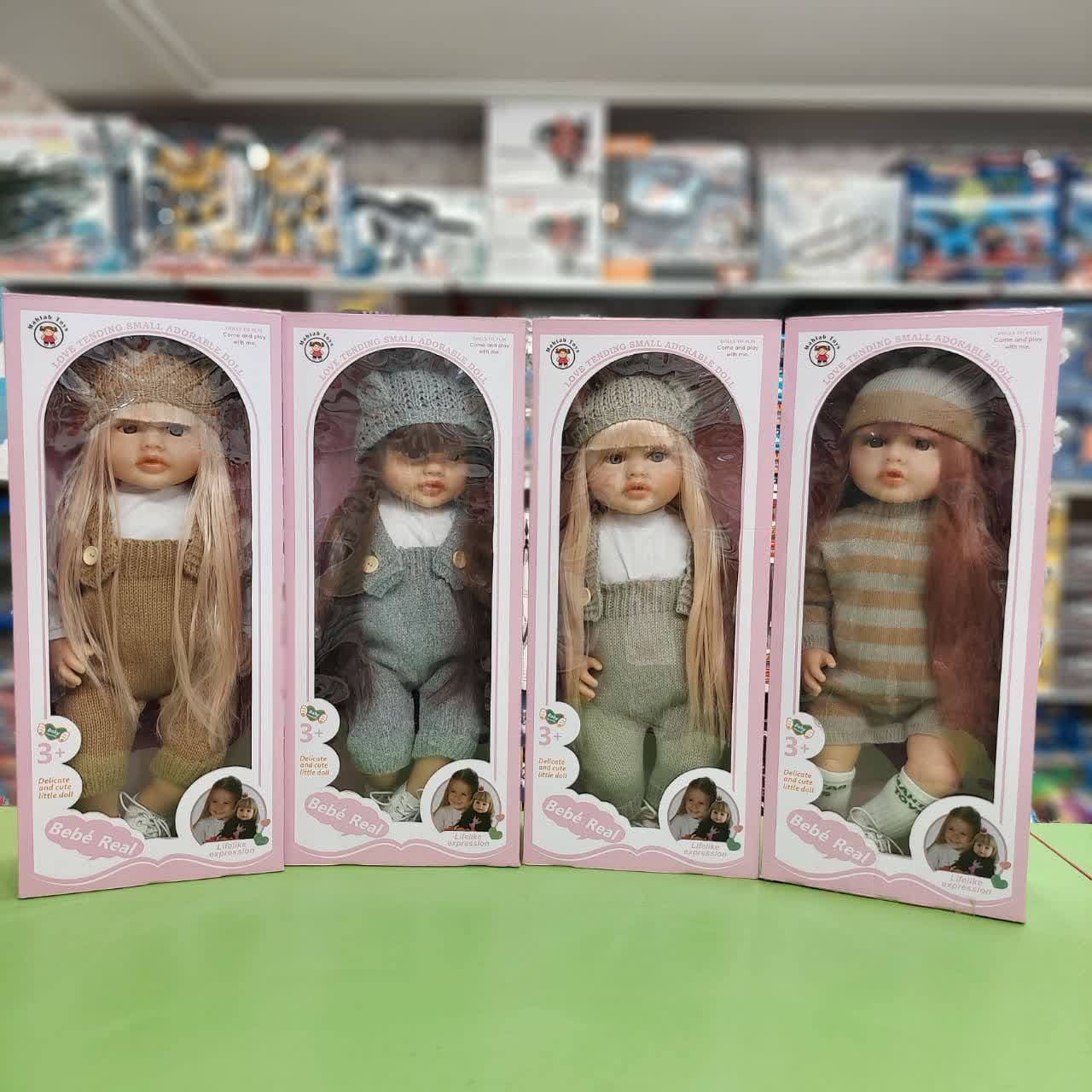 عروسک سیلیکونی سنسوردار هوشمند موزیکال – بدن نرم با لباس زمستانی کد 2801/8