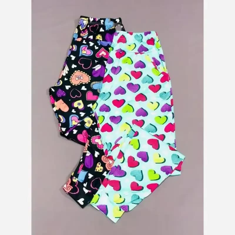 شلوار راحتی زنانه گیاهی وارداتی قواره بزرگ جیب دار طرح فانتزی سایز 38 تا 50 — تصویر ۲